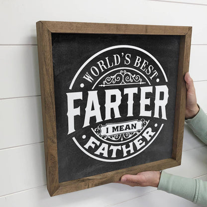 "World's Best Farter, I Mean Father" Sign on Wall