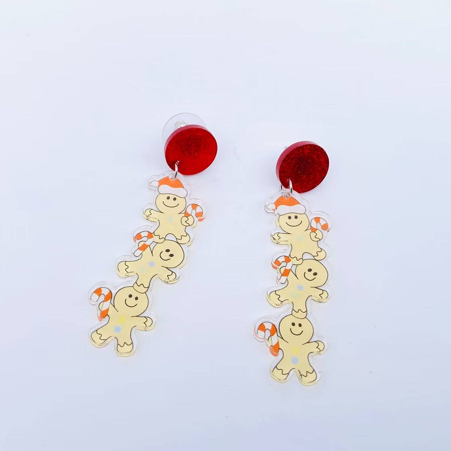 Stacked Gingerbread Men Dangle Earrings White Background