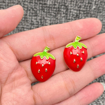 Strawberry Enamel Stud Earrings in Hand