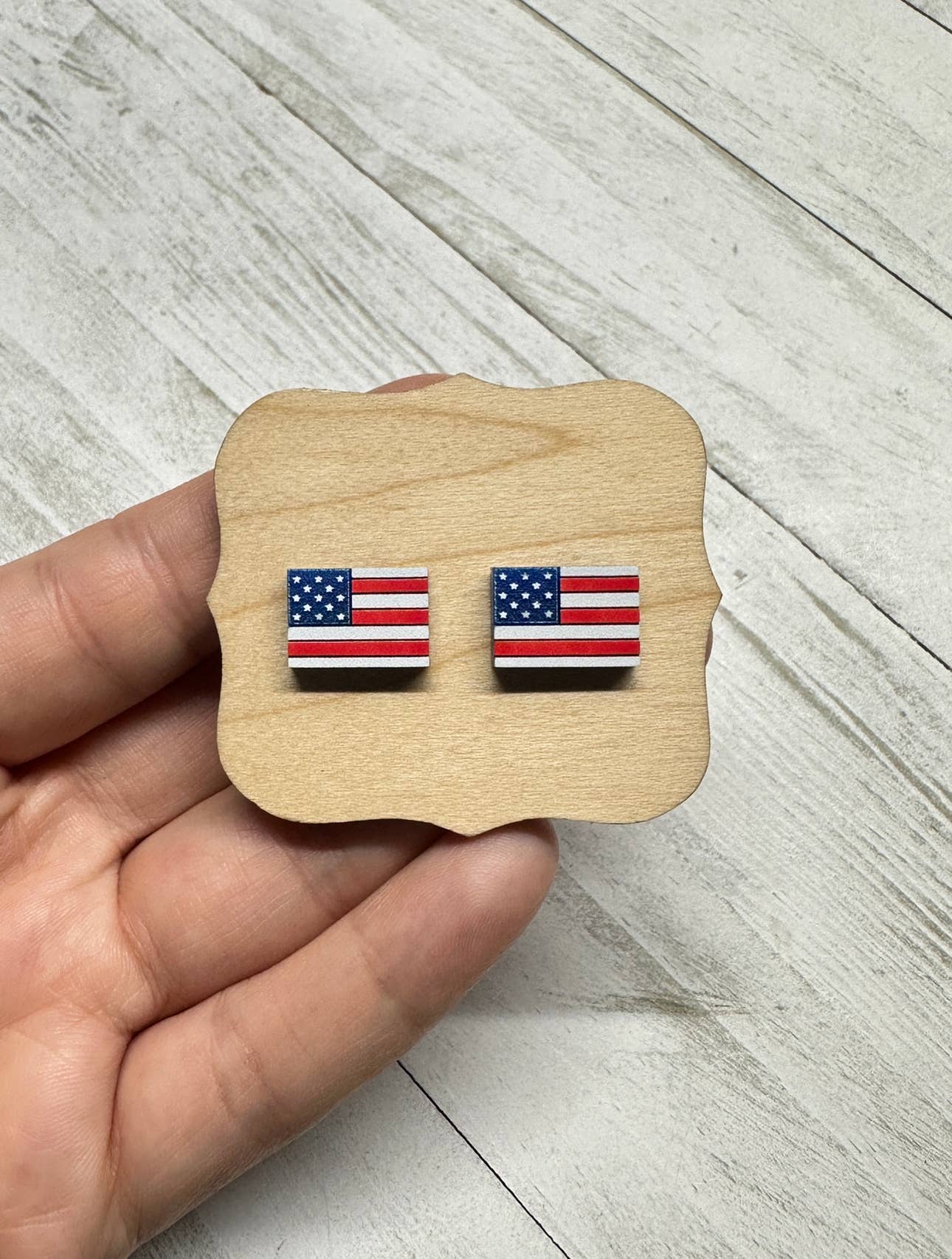 USA Flag Stud Earrings in Hand