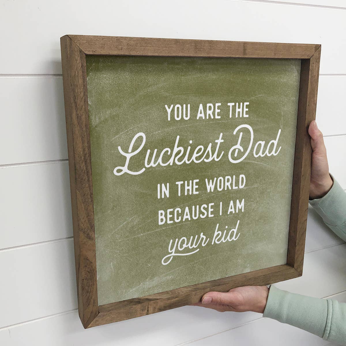 "You Are The Luckiest Dad in the World, Because I Am Your Kid" Sign on Wall