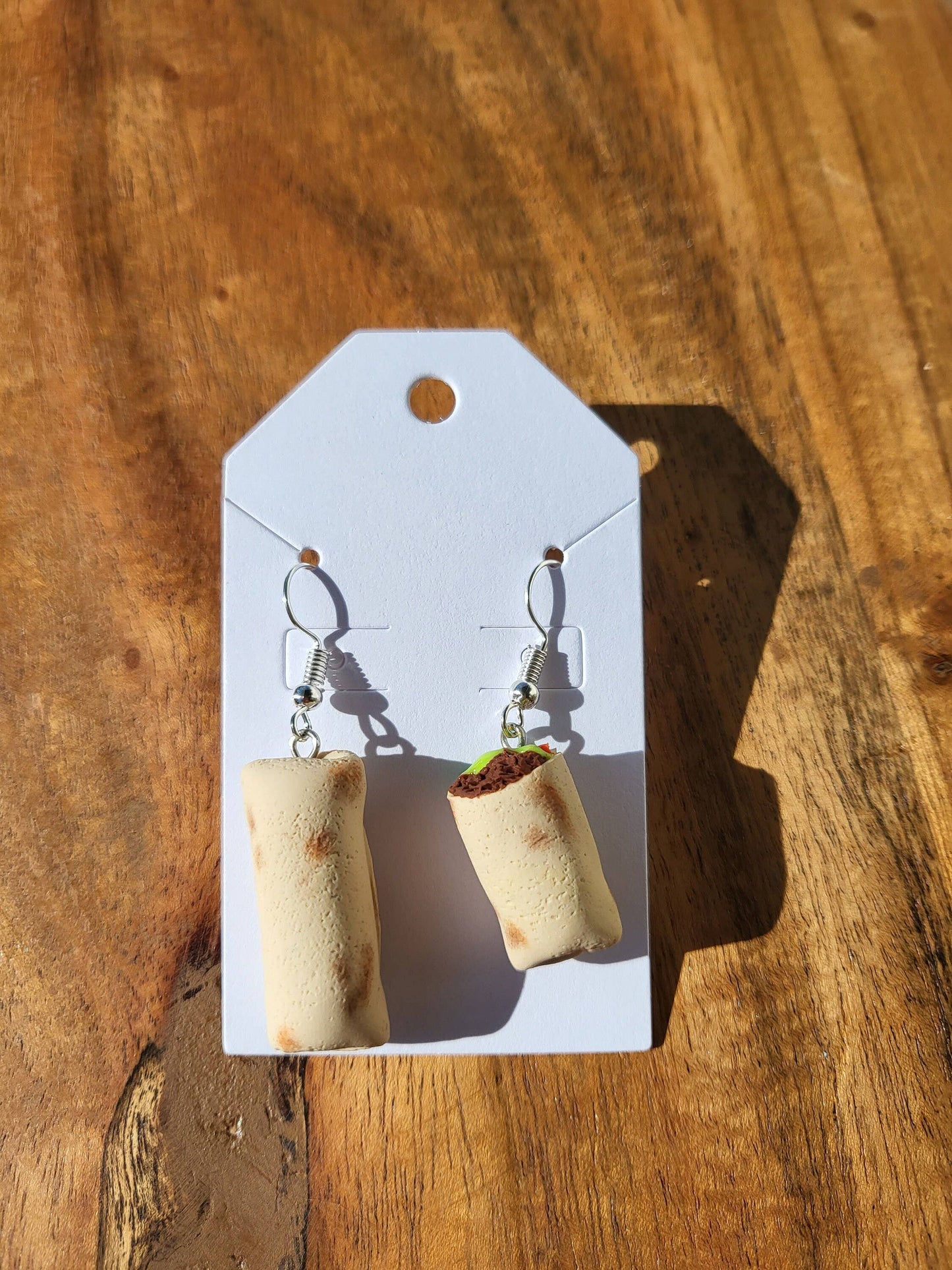 realistic burrito earrings on earring card 2