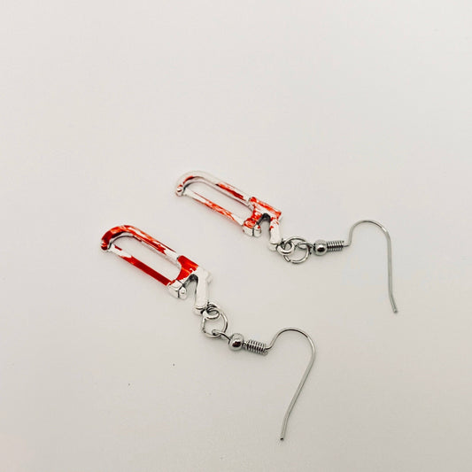 bloody metal saw earrings halloween